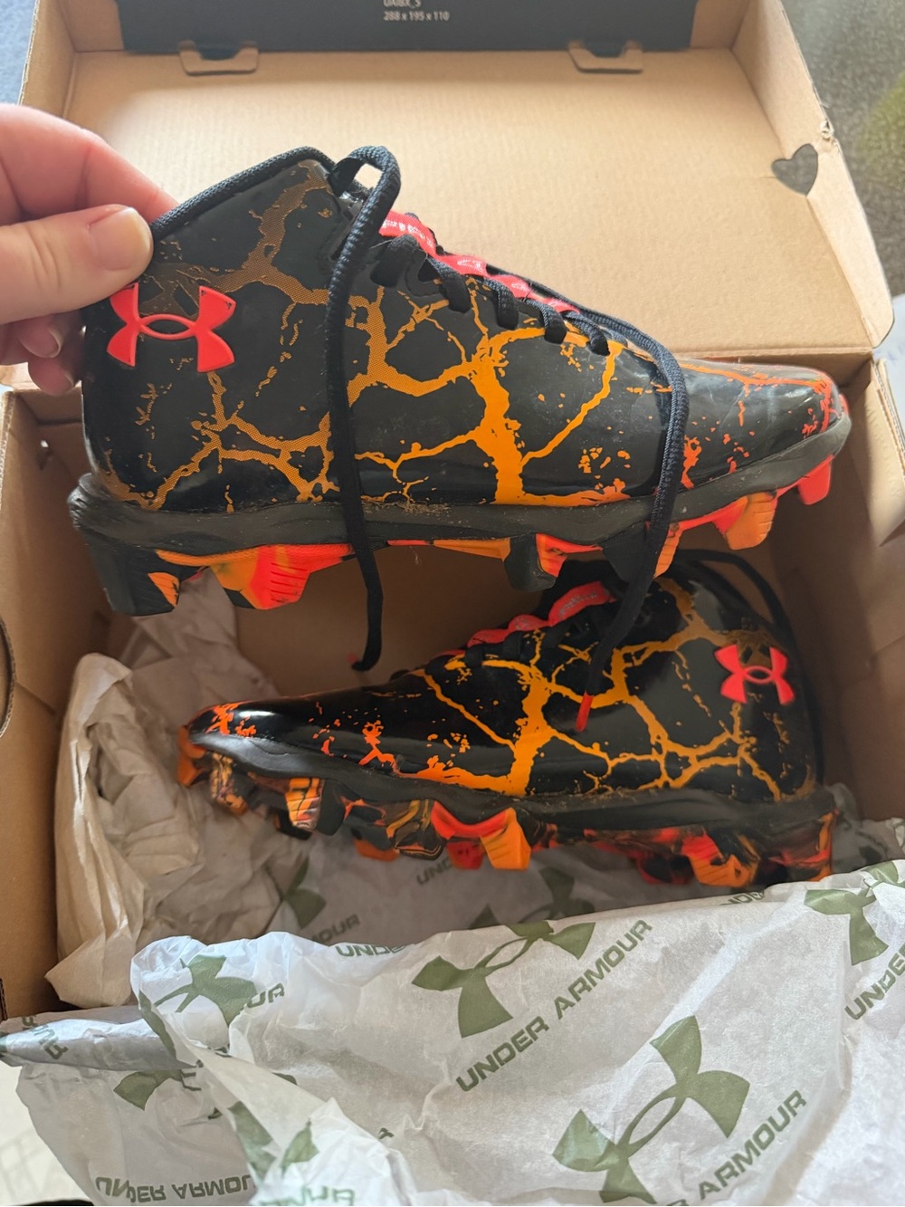 Under Armour Black & Orange Kids' Cleats with Cracked-Glow Pattern